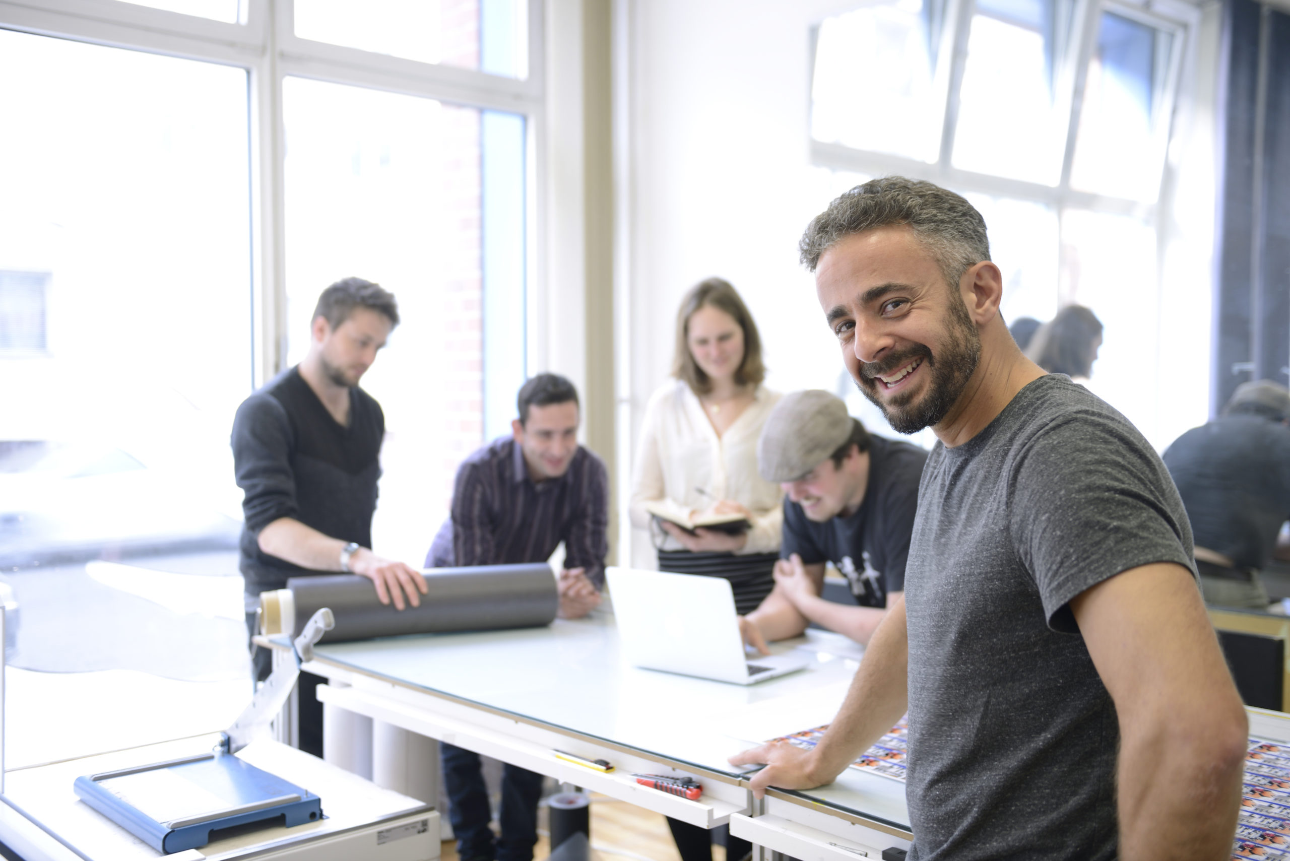 advertising agency owner and his team Conseil informatique